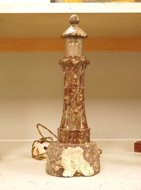 A serpentine lamp modelled as a lighthouse, 34cm high